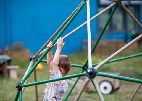 Young child on a climbing frame