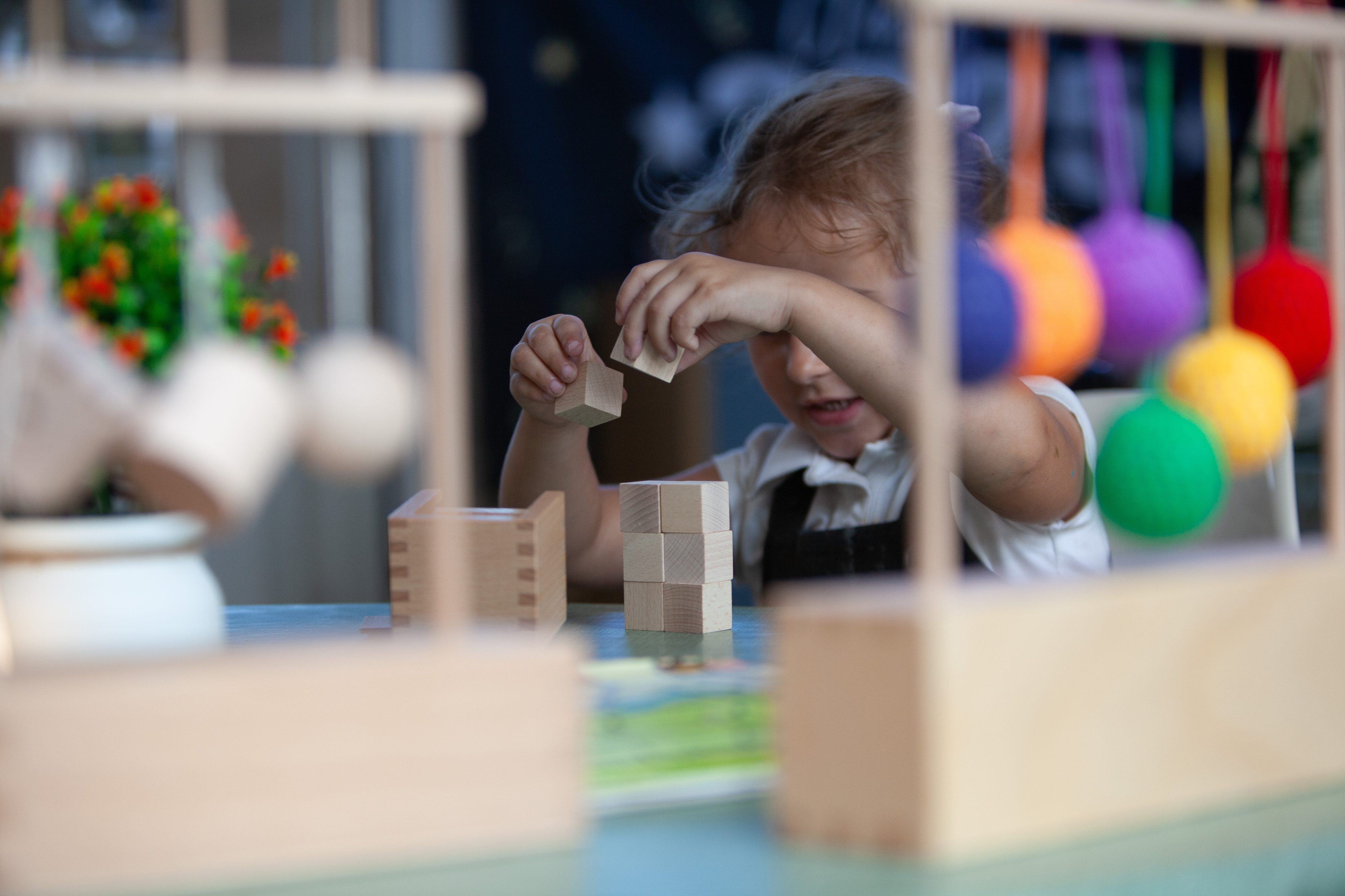 Young child playing with blocks